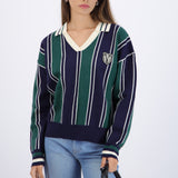 Suéter cuello polo detalle escudo