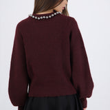Suéter cuello redondo perlas