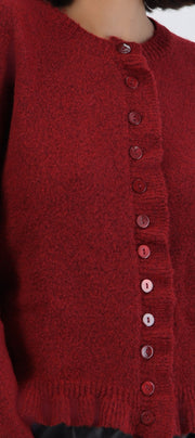 Cárdigan detalle olanes textura