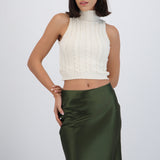 Chaleco trenzado cuello alto