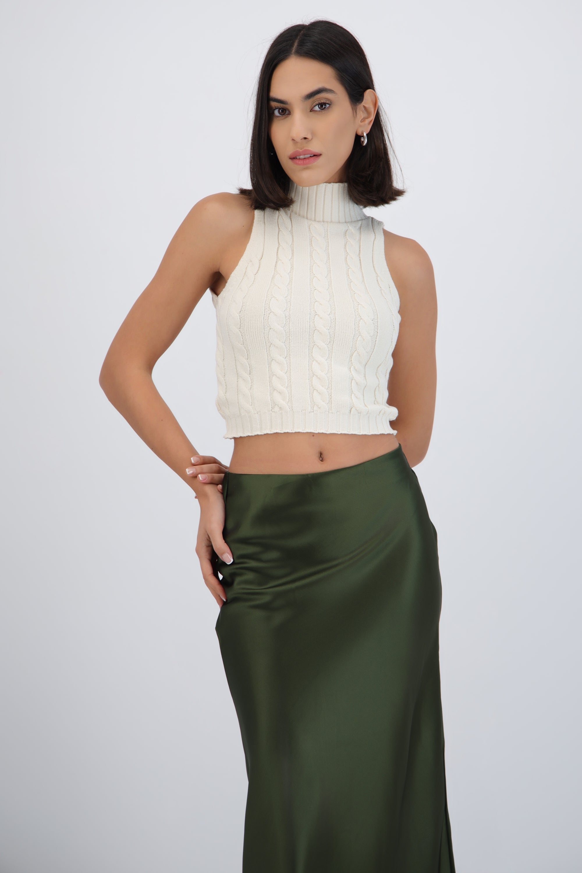 Chaleco trenzado cuello alto