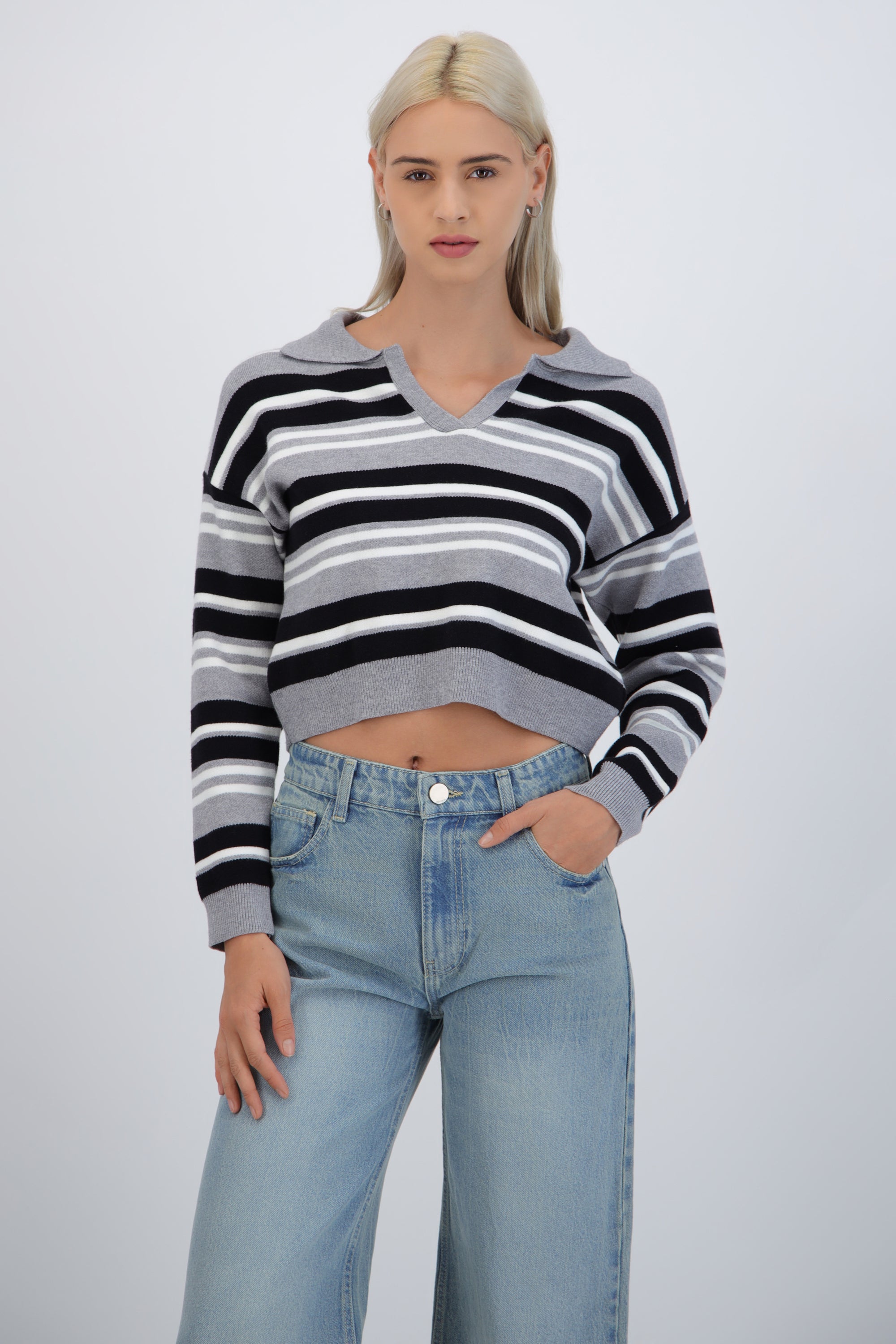 Suéter cuello polo rayas combo
