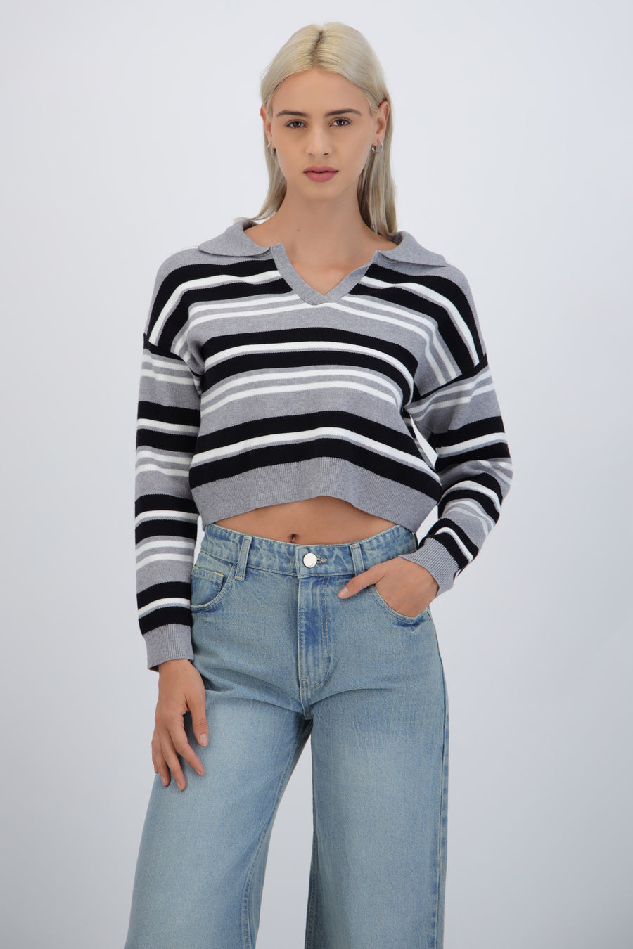 Suéter cuello polo rayas combo