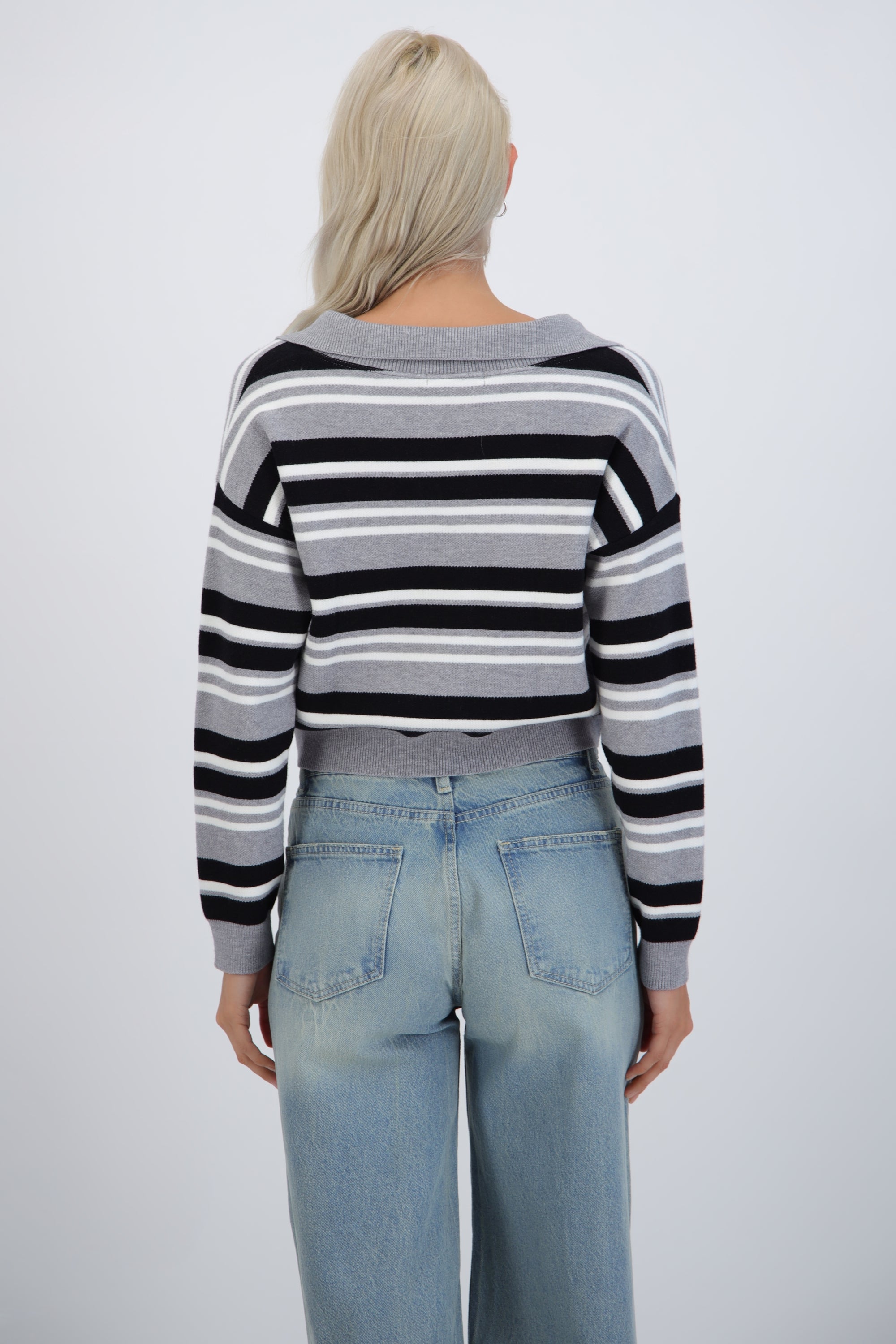 Suéter cuello polo rayas combo