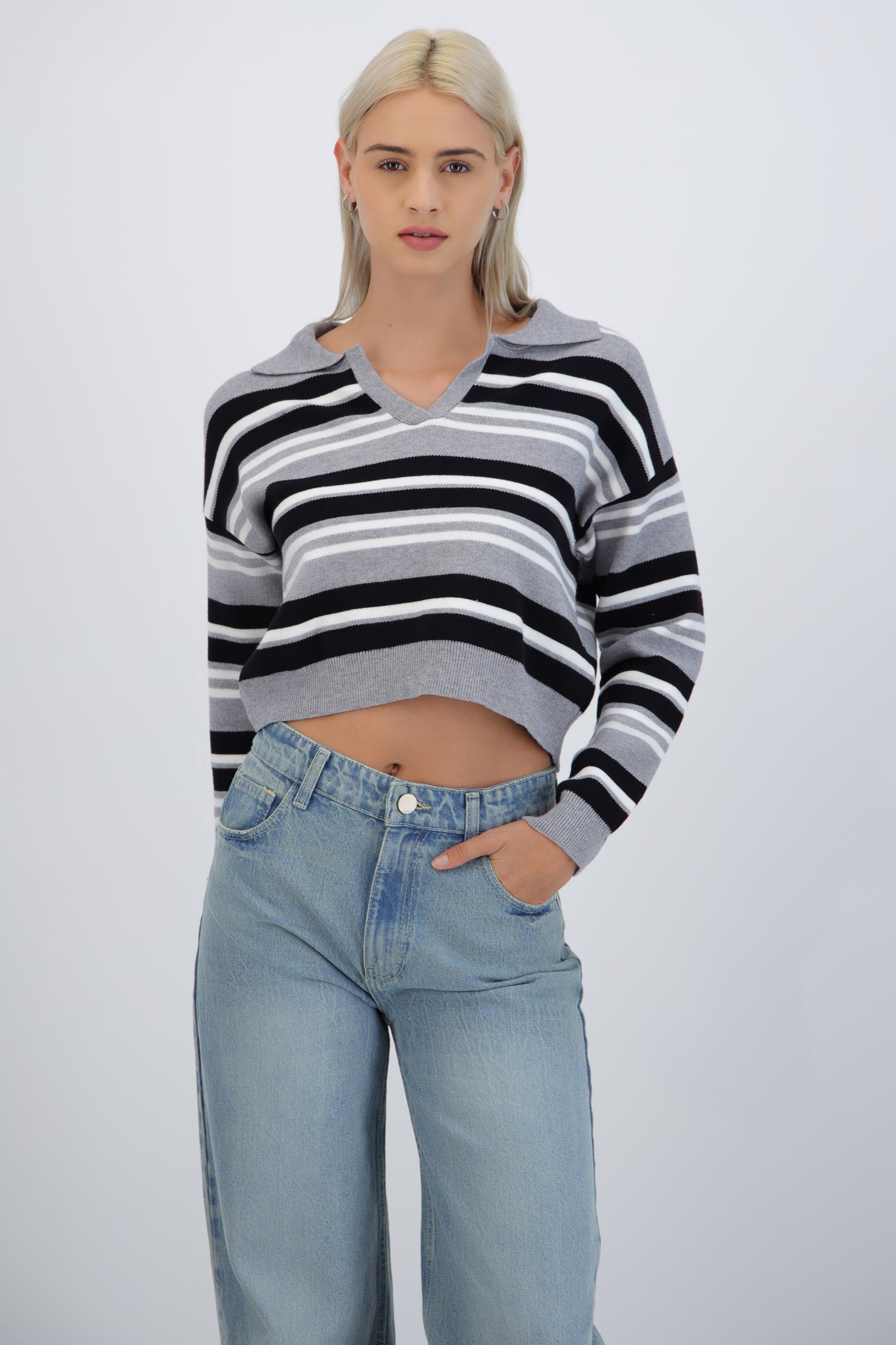 Suéter cuello polo rayas combo