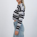 Suéter cuello polo rayas combo