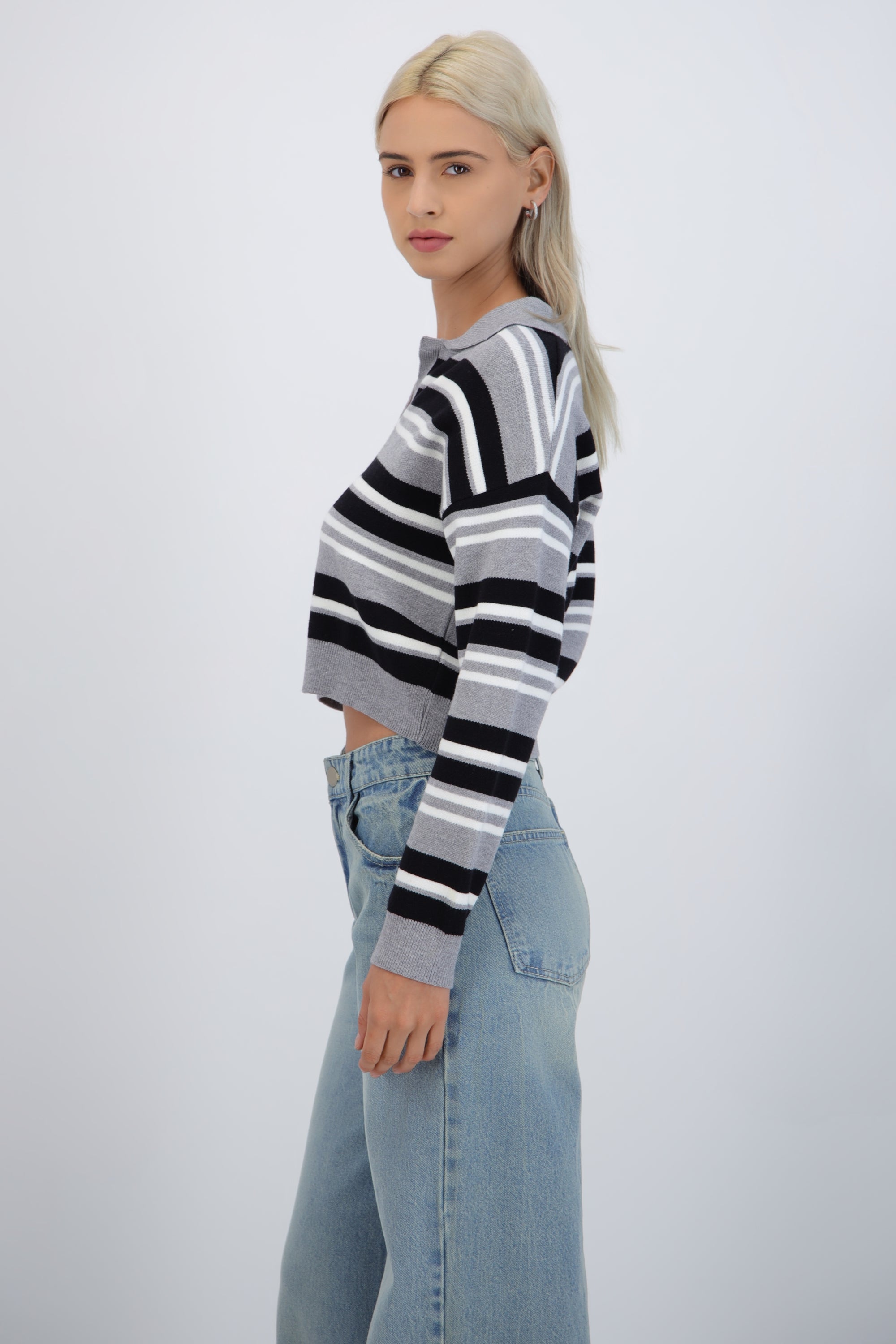 Suéter cuello polo rayas combo