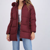 Puffer larga detalle gorro peluche