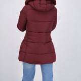 Puffer larga detalle gorro peluche