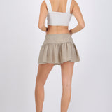Falda mini olan detalle moño