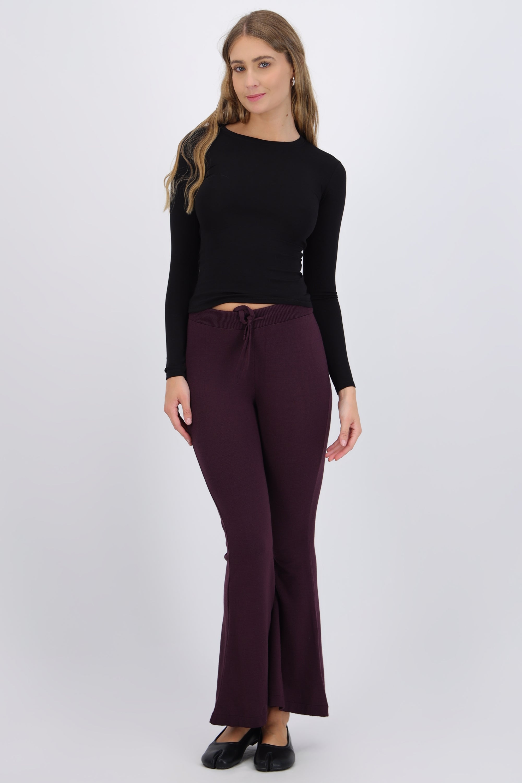 Pantalón flare tejido detalle jareta