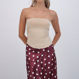 Top bandeau fruncido con aberturas