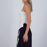 Top bandeau fruncido con aberturas