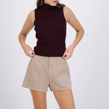 Top tejido sin manga cuello alto