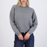 Suéter cuello redondo textura suave