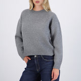 Suéter cuello redondo textura suave