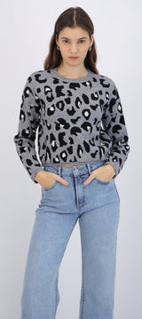 Suéter cuello redondo detalle leopardo