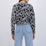 Suéter cuello redondo detalle leopardo