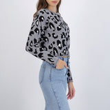 Suéter cuello redondo detalle leopardo