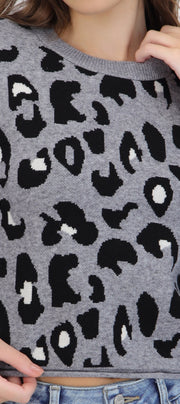 Suéter cuello redondo detalle leopardo