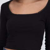 Top manga larga detalle cuello