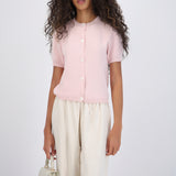 Top cuello redondo detalle botones