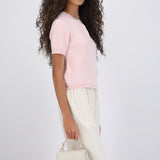 Top cuello redondo detalle botones