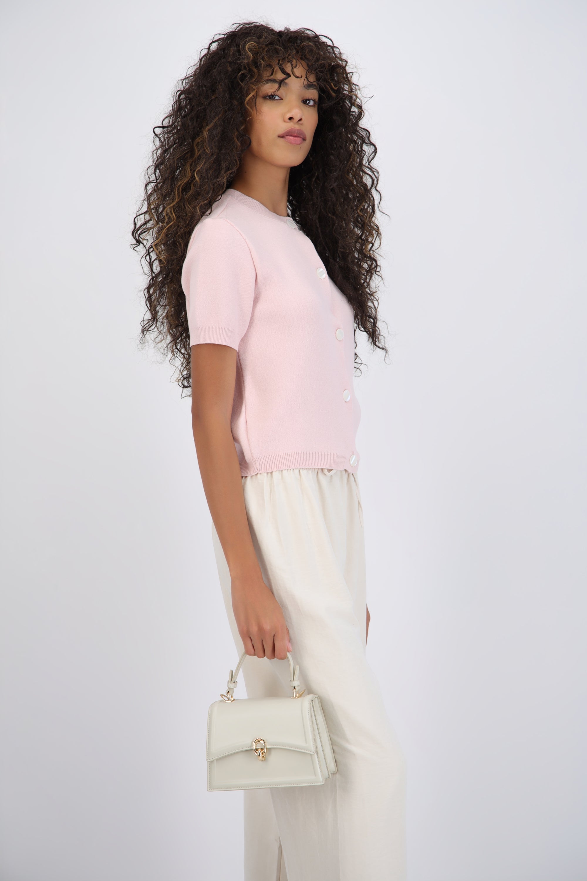 Top cuello redondo detalle botones