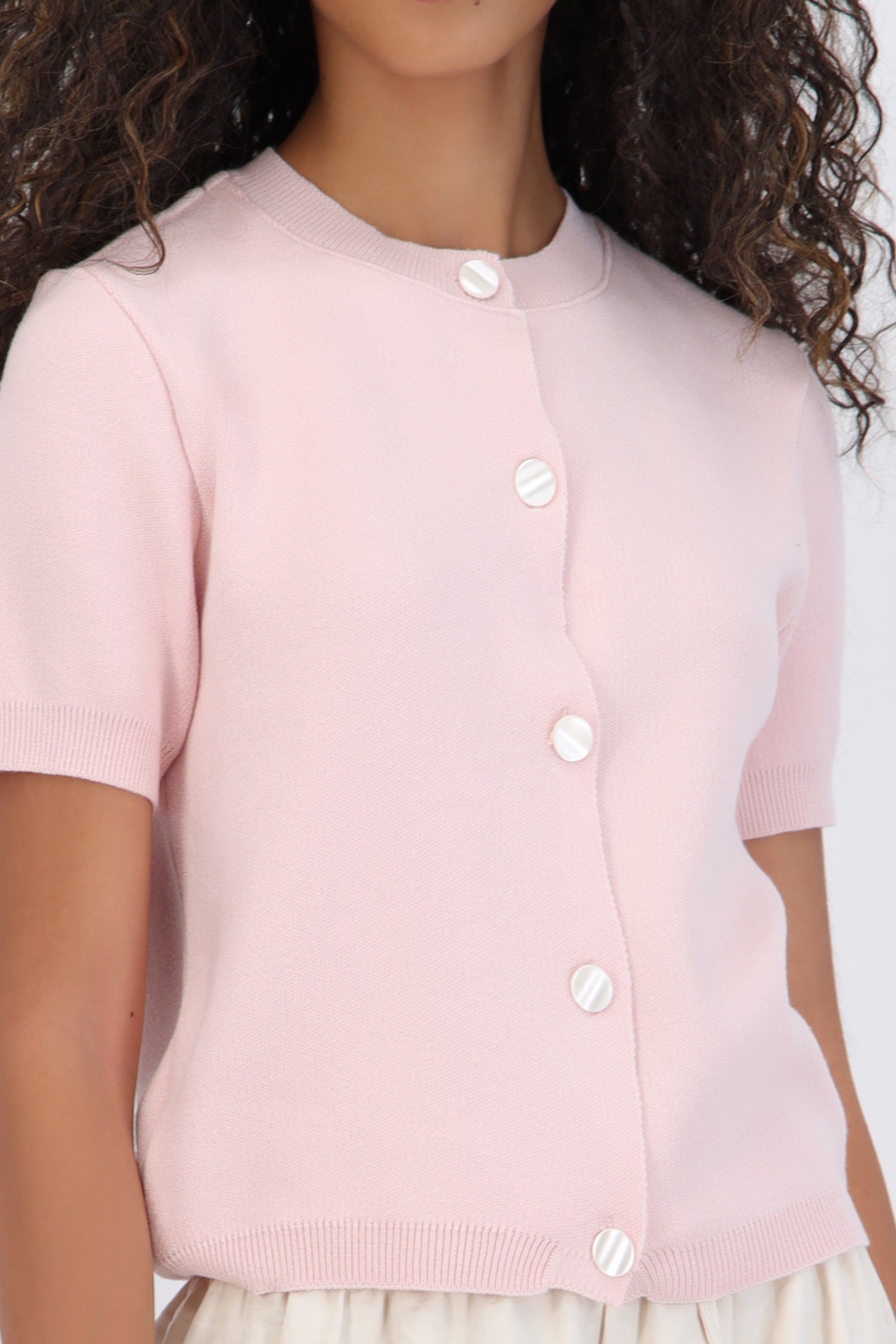 Top cuello redondo detalle botones