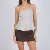 Top strapless peplum