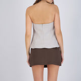 Top strapless peplum