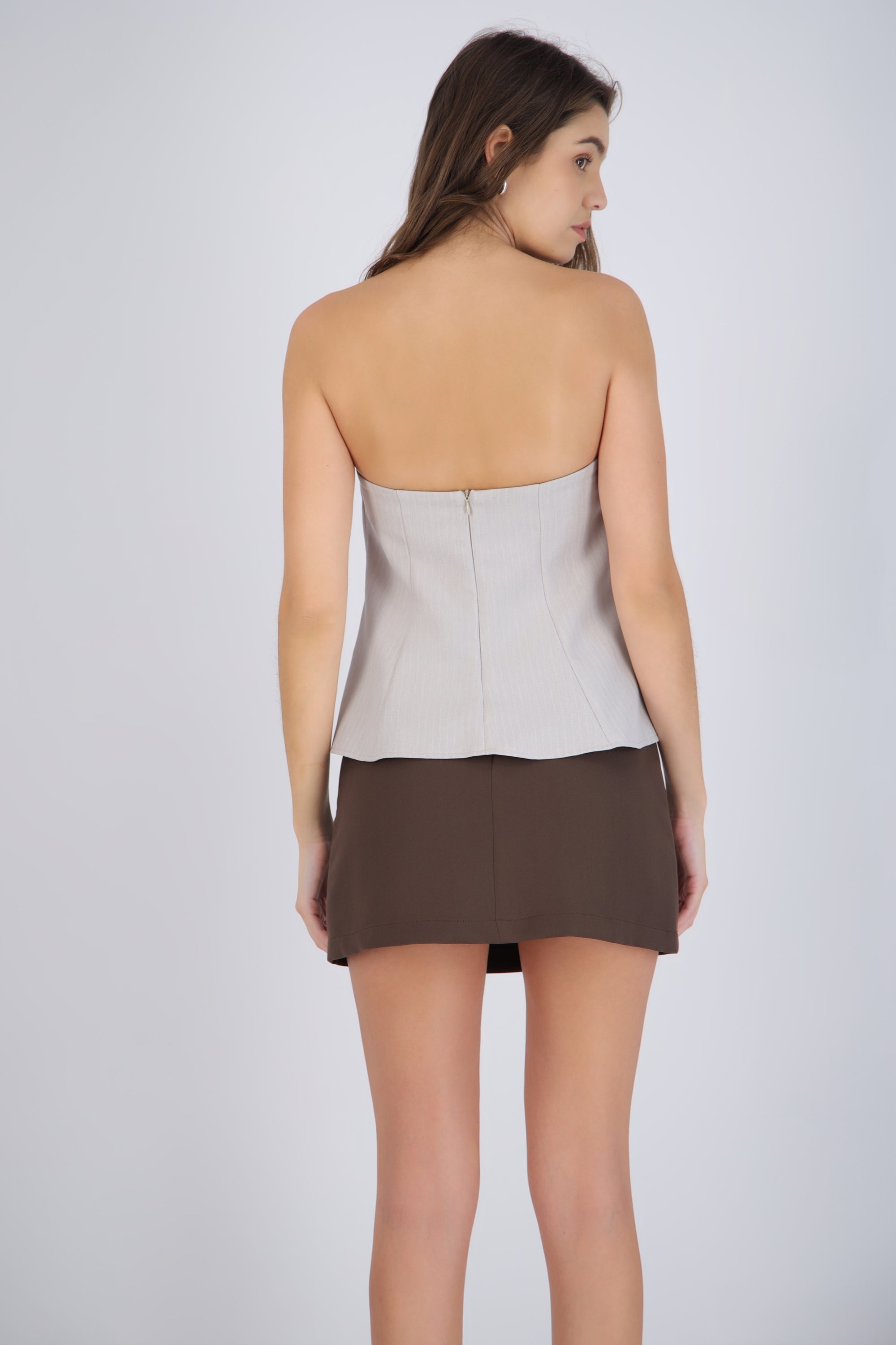 Top strapless peplum
