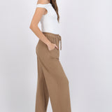 Pantalón liso suede detalle jareta