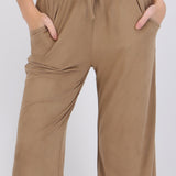 Pantalón liso suede detalle jareta