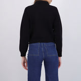 Suéter cuello polo brillos