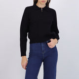 Suéter cuello polo brillos