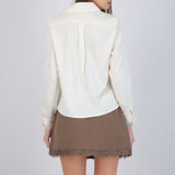 Camisa satin detalle encaje cuello