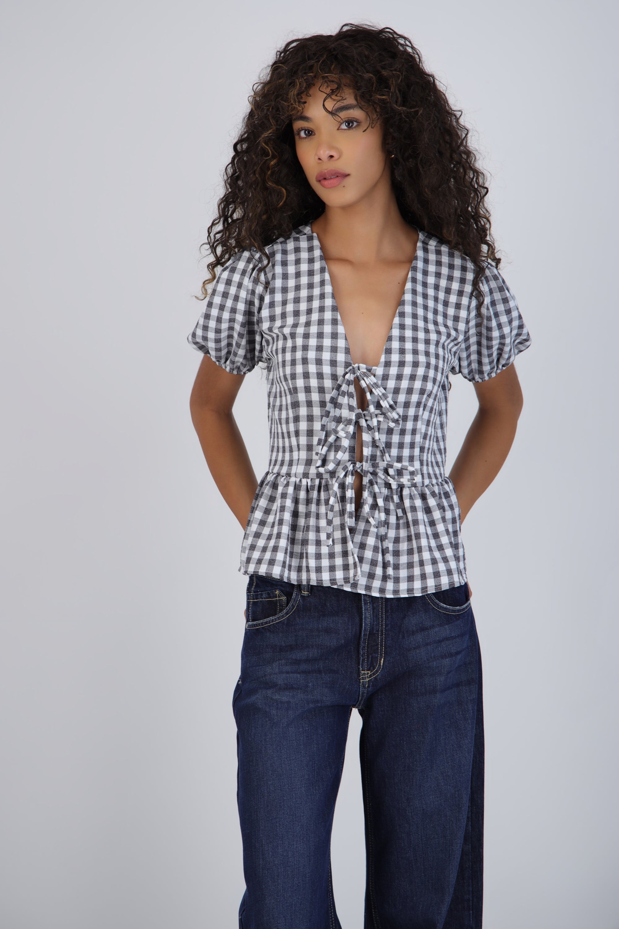 Blusa manga corta cuadros detalle moños