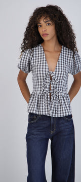 Blusa manga corta cuadros detalle moños