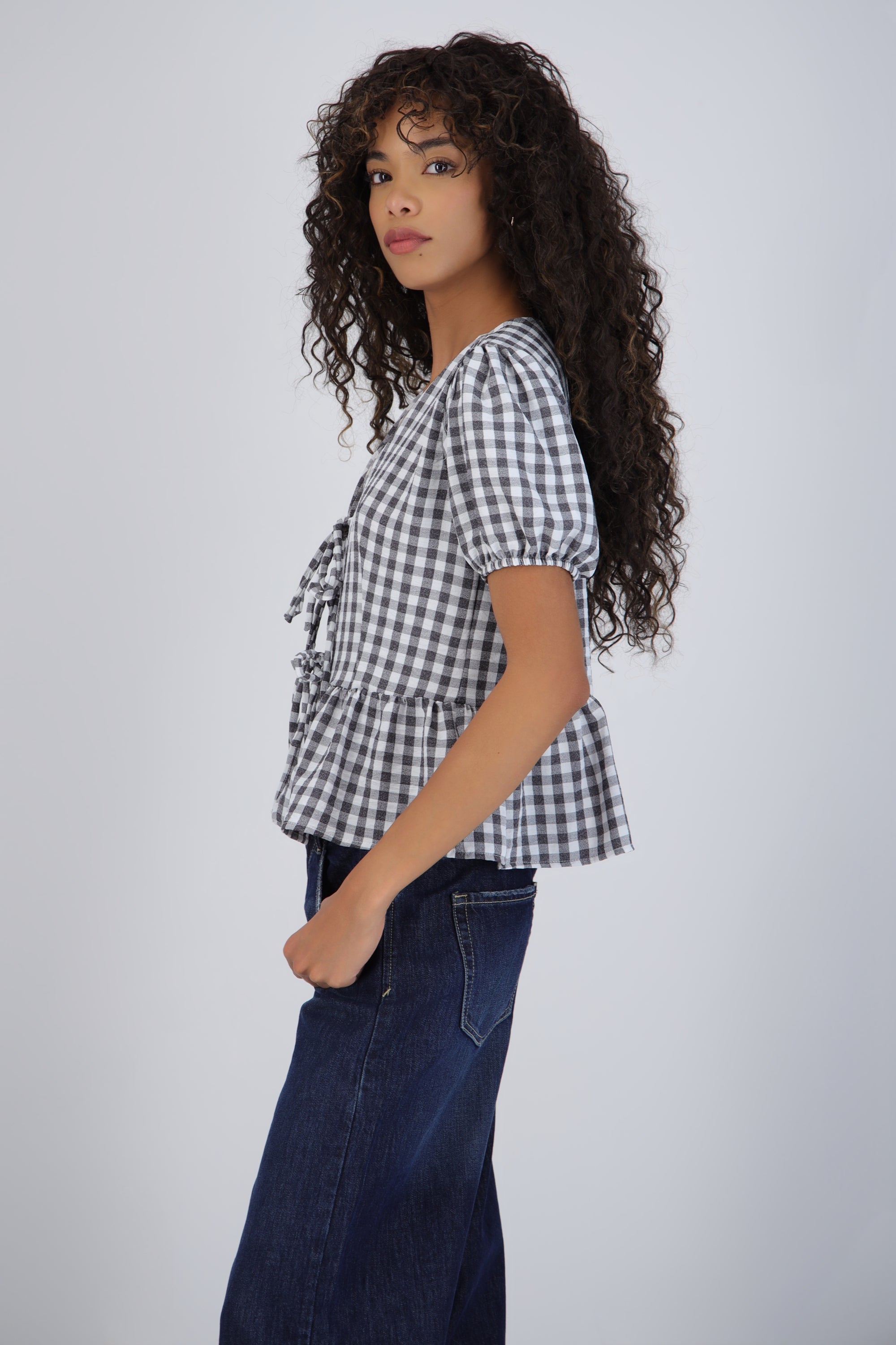 Blusa manga corta cuadros detalle moños