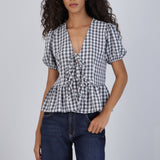 Blusa manga corta cuadros detalle moños