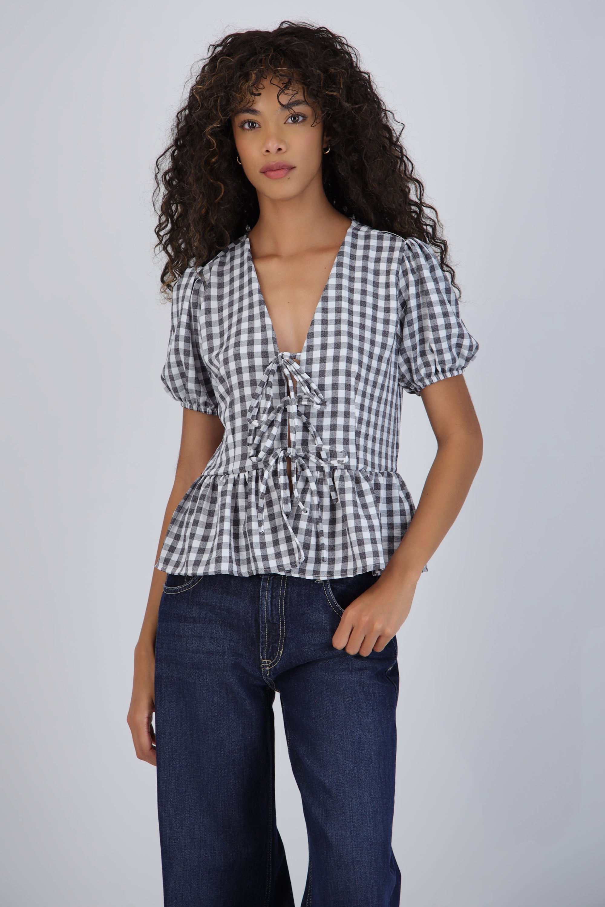 Blusa manga corta cuadros detalle moños