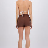 Short envolvente nudo