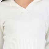 Suéter cuello polo detalle acanalado