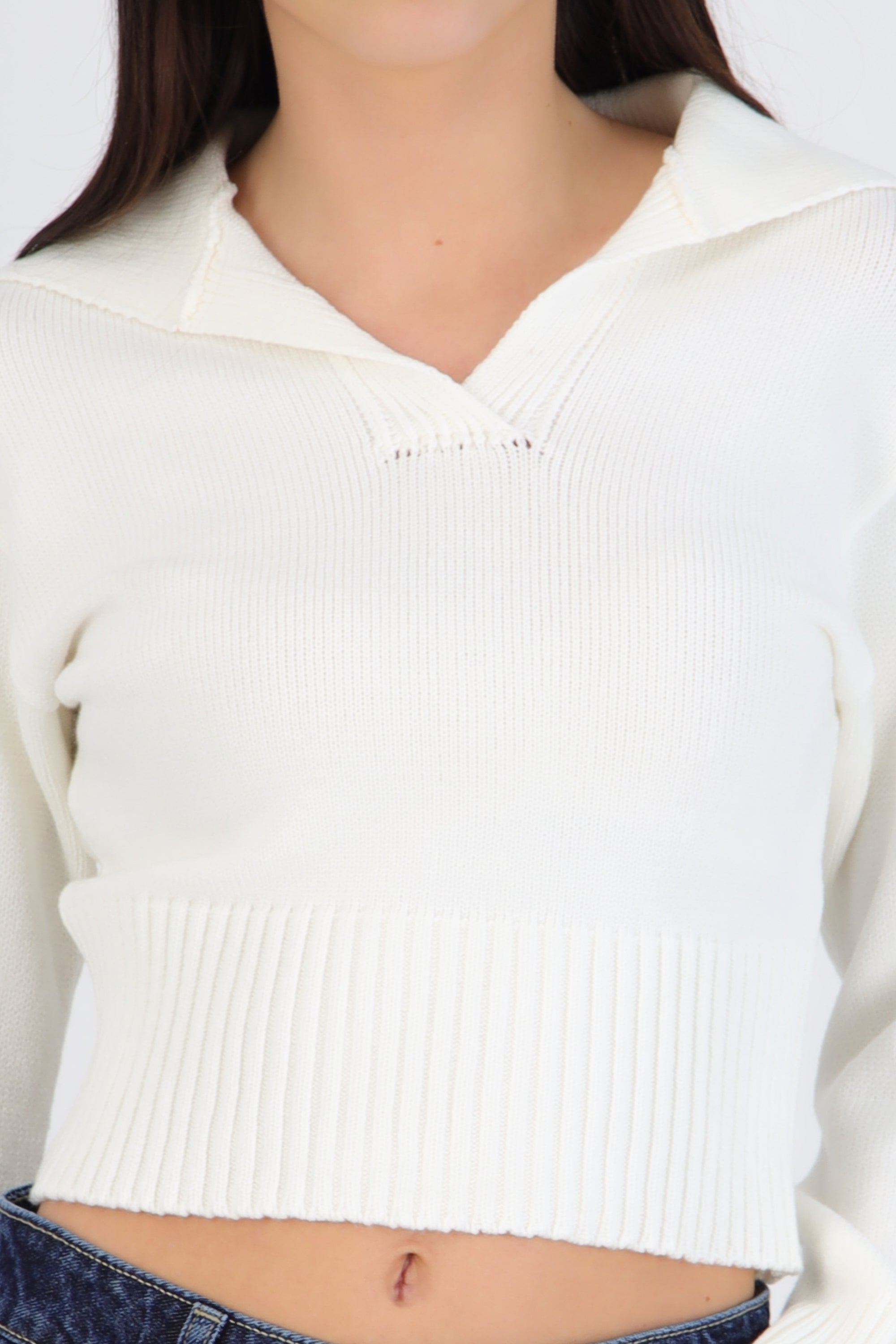 Suéter cuello polo detalle acanalado