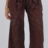 Pantalón con jareta flores lentejuelas