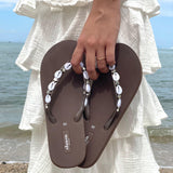 Flip flop conchas marinas
