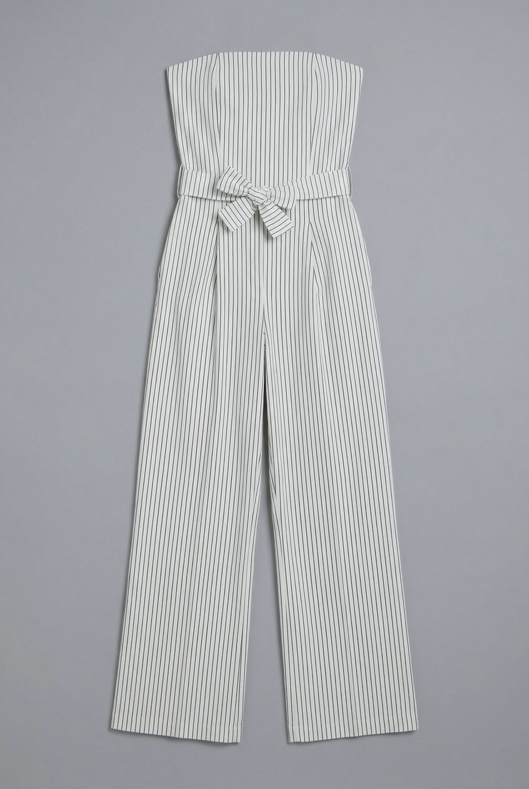 Jumpsuit strapless rayas detalle laso BLANCO COMBO
